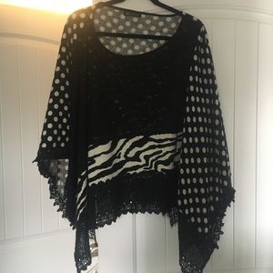 Mechant Poncho black and white with lace detail